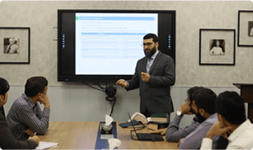 A CBD Punjab employee focused on their work, illustrating the opportunity to unlock personal potential.